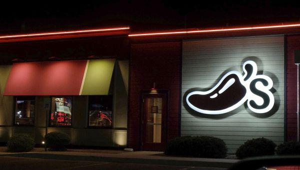 A Chili's restaurant logo stands lit in El Paso, Tex., Wednesday, Oct. 23, 2019.  - Sputnik International