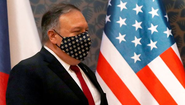 U.S. Secretary of State Mike Pompeo wears a star-spangled mask as he arrives for a joint news conference with the Czech prime minister, at the start of a four-nation tour of Europe, in Prague, Czech Republic August 12, 2020. U.S. Secretary of State Mike Pompeo wears a star-spangled mask as he arrives for a joint news conference with the Czech prime minister, at the start of a four-nation tour of Europe, in Prague, Czech Republic August 12, 2020. - Sputnik International
