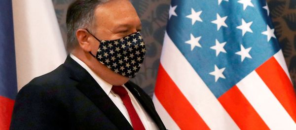 U.S. Secretary of State Mike Pompeo wears a star-spangled mask as he arrives for a joint news conference with the Czech prime minister, at the start of a four-nation tour of Europe, in Prague, Czech Republic August 12, 2020. U.S. Secretary of State Mike Pompeo wears a star-spangled mask as he arrives for a joint news conference with the Czech prime minister, at the start of a four-nation tour of Europe, in Prague, Czech Republic August 12, 2020. - Sputnik International
