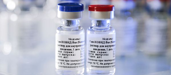 In this handout photo released by Russian Direct Investment Fund and the Gamaleya Scientific Research Institute of Epidemiology and Microbiology, phials of the world's first coronavirus vaccine registered in Russia are pictured in Moscow. - Sputnik International