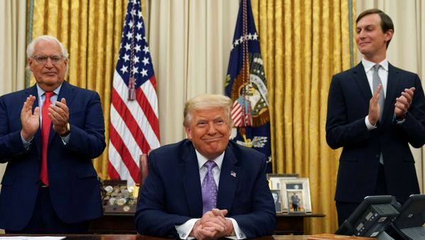 U.S. Ambassador to Israel David Melech Friedman and White House senior adviser Jared Kushner applaud after U.S. President Donald Trump announced a peace deal between Israel and the United Arab Emirates from the Oval Office of the White House in Washington, U.S., August 13, 2020 - Sputnik International