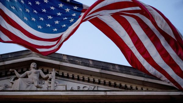 In this March 22, 2019 file photo, an American flag flies outside the Department of Justice in Washington - Sputnik International