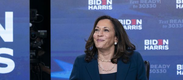 Democratic presidential candidate former Vice President Joe Biden's running mate Sen. Kamala Harris, D-Calif., looks up as she signs required documents for receiving the Democratic nomination for President and Vice President of the United States in Wilmington, Del., Friday, Aug. 14, 2020 Democratic presidential candidate former Vice President Joe Biden's running mate Sen. Kamala Harris, D-Calif., looks up as she signs required documents for receiving the Democratic nomination for President and Vice President of the United States in Wilmington, Del., Friday, Aug. 14, 2020 - Sputnik International