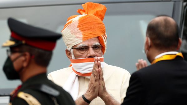 Indian Prime Minister Narendra Modi greets officers as he arrives to attend Independence Day celebrations at the historic Red Fort in Delhi, India, August 15, 2020. REUTERS/Adnan Abidi Indian Prime Minister Narendra Modi greets officers as he arrives to attend Independence Day celebrations at the historic Red Fort in Delhi, India, August 15, 2020. REUTERS/Adnan Abidi - Sputnik International