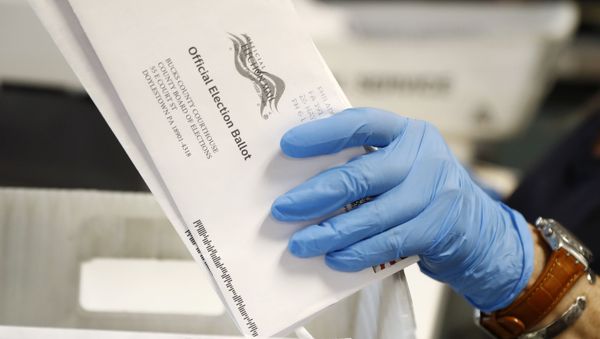  In this May 27, 2020 file photo, a worker processes mail-in ballots at the Bucks County Board of Elections office prior to the primary election in Doylestown, Pa - Sputnik International