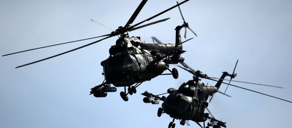 Belarus' military helicopters fly during the joint Russian-Belarusian military exercises Zapad-2017 (West-2017) at a training ground near the village of Volka, some 200 km southwest of Minsk, on September 19, 2017. Belarus' military helicopters fly during the joint Russian-Belarusian military exercises Zapad-2017 (West-2017) at a training ground near the village of Volka, some 200 km southwest of Minsk, on September 19, 2017. - Sputnik International