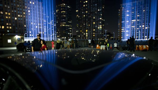 People watch the Tribute in Light at lower Manhattan, Wednesday, Sept. 11, 2019, in New York. Each year the city shines the powerful columns of light into the sky from Lower Manhattan to represent the fallen twin towers of the World Trade Center. - Sputnik International