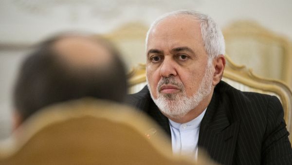 Iranian Foreign Minister Mohammad Javad Zarif listens to Russian Foreign Minister Sergey Lavrov during their talks in Moscow, Russia, Monday, Dec. 30, 2019. - Sputnik International