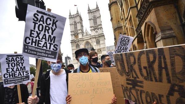 People take part in a protest in Westminster in London over the government's handling of A-level results, Friday, Aug. 14, 2020. Thousands of school-leaving children in Britain have been left distraught after finding out that they were handed lower-than-expected grades. The government is under growing pressure to address the question of how to fairly award students grades in the absence of actual exams. - Sputnik International