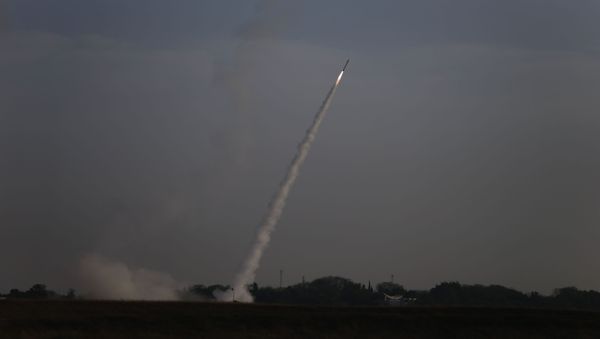 Israeli Iron Dome air defense system launches to intercept rocket fro Gaza Strip, near Israel and Gaza border, Sunday, May 5, 2019. Palestinian militants in the Gaza Strip on Sunday intensified a wave of rocket fire into southern Israel, striking towns and cities across the region while Israeli forces struck dozens of targets throughout Gaza, including militant sites that it said were concealed in homes or residential areas. - Sputnik International