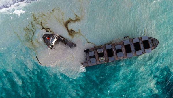 This aerial picture taken on August 16, 2020, shows the MV Wakashio bulk carrier that had run aground and broke into two parts near Blue Bay Marine Park, Mauritius - Sputnik International