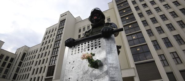 A member of the Belarusian Interior Ministry troops stands guard during protests in Minsk. 14 August 2020 A member of the Belarusian Interior Ministry troops stands guard during protests in Minsk. 14 August 2020 - Sputnik International