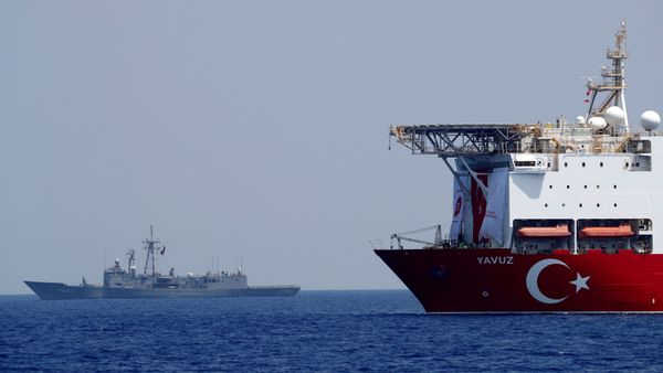 The Turkish drilling vessel Yavuz is seen being escorted by a Turkish Navy frigate in the eastern Mediterranean off Cyprus, August 6, 2019 - Sputnik International