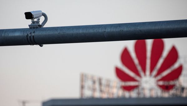 A surveillance camera is seen in front of a Huawei logo in Belgrade, Serbia, August 11, 2020. Picture taken August 11, 2020 - Sputnik International