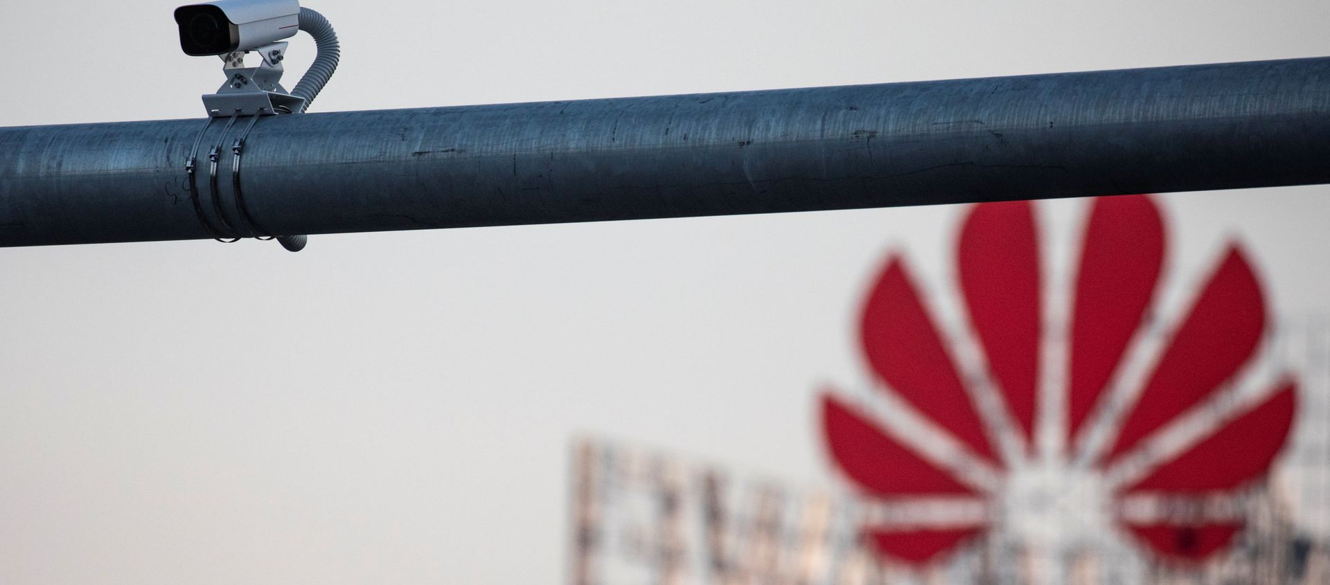 A surveillance camera is seen in front of a Huawei logo in Belgrade, Serbia, August 11, 2020. Picture taken August 11, 2020 A surveillance camera is seen in front of a Huawei logo in Belgrade, Serbia, August 11, 2020. Picture taken August 11, 2020 - Sputnik International, 1920, 11.09.2020