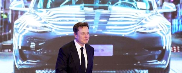Tesla Inc CEO Elon Musk walks next to a screen showing an image of Tesla Model 3 car during an opening ceremony for Tesla China-made Model Y program in Shanghai, China January 7, 2020 Tesla Inc CEO Elon Musk walks next to a screen showing an image of Tesla Model 3 car during an opening ceremony for Tesla China-made Model Y program in Shanghai, China January 7, 2020 - Sputnik International