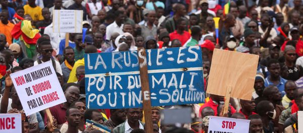 Supporters of the Imam Mahmoud Dicko and other opposition political parties attend a mass protest demanding the resignation of Mali's President Ibrahim Boubacar Keita in Bamako, Mali August 11, 2020. - Sputnik International