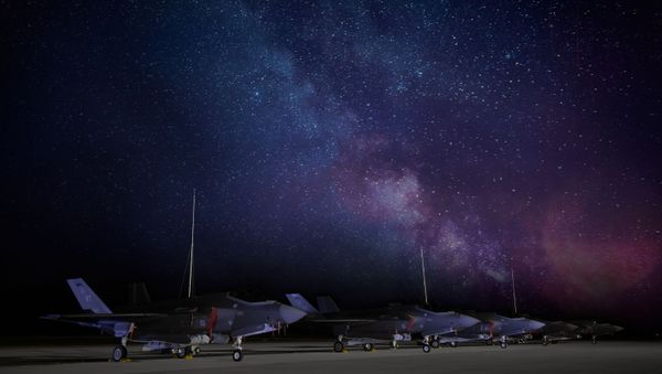 F-35A Lightning IIs assigned to the 134th Fighter Squadron, Vermont Air National Guard, sit on the flight line after a day of flying training mission at Northern Lightning 2020, Volk Field, Wis., Aug. 11, 2020. F-35A Lightning IIs assigned to the 134th Fighter Squadron, Vermont Air National Guard, sit on the flight line after a day of flying training mission at Northern Lightning 2020, Volk Field, Wis., Aug. 11, 2020. - Sputnik International