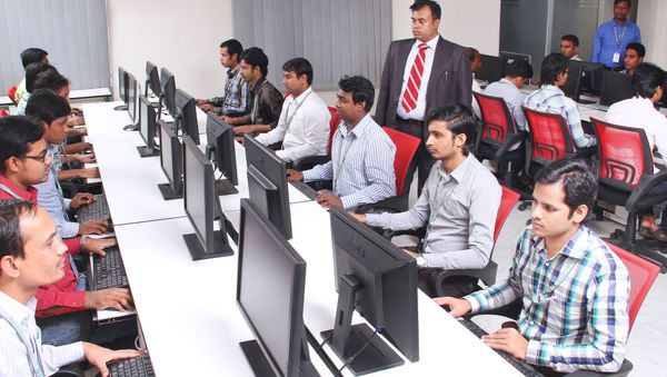 Group of men sitting in front of table facing monitors Group of men sitting in front of table facing monitors - Sputnik International