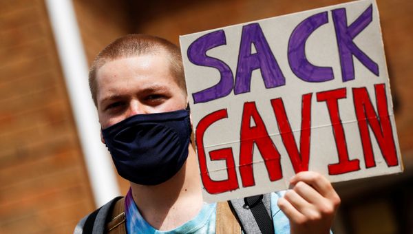 A-level student holds a placard during a protest about the exam results at the constituency offices of Education Secretary Gavin Williamson, amid the spread of the coronavirus disease (COVID-19), in South Staffordshire, Britain, August 17, 2020. REUTERS/Jason Cairnduff A-level student holds a placard during a protest about the exam results at the constituency offices of Education Secretary Gavin Williamson, amid the spread of the coronavirus disease (COVID-19), in South Staffordshire, Britain, August 17, 2020. REUTERS/Jason Cairnduff - Sputnik International