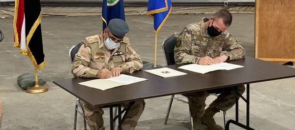 US and Iraqi officials sign agreement on handover of Camp Taji to Iraqi forces. August 23, 2020. - Sputnik International