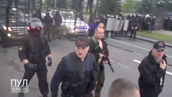 Belarusian President Alexander Lukashenko walks outside the Independence Palace after an opposition demonstration against presidential election results, in Minsk, Belarus, in this in this still image from a handout video taken August 23, 2020. Video taken August 23, 2020. Courtesy of POOL PERVOGO/Handout via REUTERS TV Belarusian President Alexander Lukashenko walks outside the Independence Palace after an opposition demonstration against presidential election results, in Minsk, Belarus, in this in this still image from a handout video taken August 23, 2020. Video taken August 23, 2020. Courtesy of POOL PERVOGO/Handout via REUTERS TV - Sputnik International