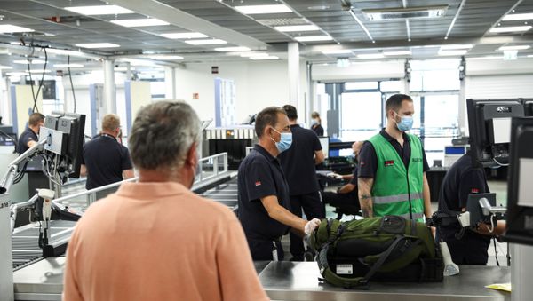 A security check is pictured in the former Berlin Schoenefeld airport that has been integrated as Terminal T5 into the newly built Berlin Brandenburg Airport Willy Brandt (BER) ahead of the opening of the airport in October in Schoenefeld, Germany, August 24, 2020 - Sputnik International