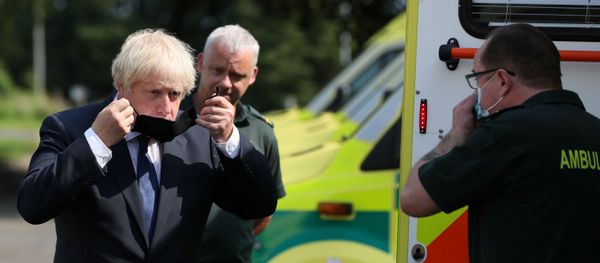 Britain's Prime Minister Boris Johnson puts on a mask at the Northern Ireland Ambulance Service HQ during his visit to Belfast, Northern Ireland, 13 August 2020 Britain's Prime Minister Boris Johnson puts on a mask at the Northern Ireland Ambulance Service HQ during his visit to Belfast, Northern Ireland, 13 August 2020 - Sputnik International