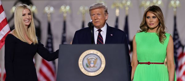 U.S. President Donald Trump looks on alongside to U.S. first lady Melania Trump and White House Senior Adviser Ivanka Trump before delivering his acceptance speech as the 2020 Republican presidential nominee during the final event of the Republican National Convention on the South Lawn of the White House in Washington, U.S., August 27, 2020.  - Sputnik International