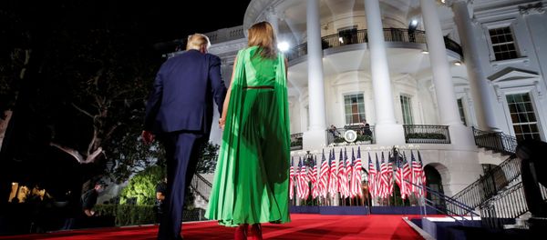 U.S. President Donald Trump walks back into the White House with first lady Melania Trump after delivering his acceptance speech as the 2020 Republican presidential nominee during the final event of the Republican National Convention on the South Lawn of the White House in Washington, U.S., August 27, 2020 - Sputnik International
