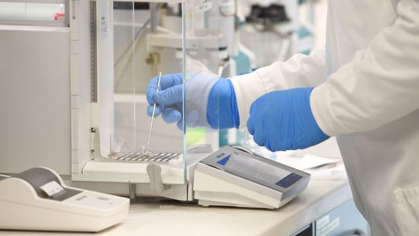 A chemist works at AstraZeneca's headquarters, after Prime Minister Scott Morrison announced Australians will be among the first in the world to receive a coronavirus disease (COVID-19) vaccine, if it proves successful, through an agreement between the government and UK-based drug company AstraZeneca, in Sydney, Australia, August 19, 2020 - Sputnik International