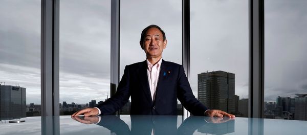 Japan's Chief Cabinet Secretary Yoshihide Suga poses for a photograph during a Thomson Reuters Newsmaker event in Tokyo, Japan, 30 August 2016. Japan's Chief Cabinet Secretary Yoshihide Suga poses for a photograph during a Thomson Reuters Newsmaker event in Tokyo, Japan, 30 August 2016. - Sputnik International