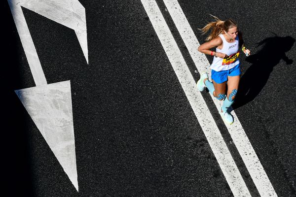 A woman takes part in a half-marathon in Moscow A woman takes part in a half-marathon in Moscow - Sputnik International