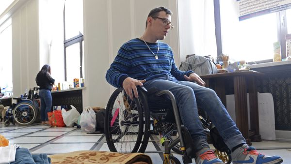 A young disabled adult - Sputnik International