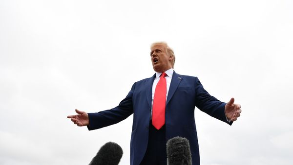 US President Donald Trump speaks to the media as he makes his way to board Air Force One before departing from Andrews Air Force Base in Maryland on September 1, 2020, heading to Kenosha, Wisconsin to meet with law enforcement officials and to survey damage following civil unrest in the city. - Sputnik International