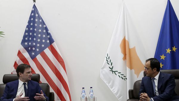 Cyprus' foreign minister Nikos Christodoulides, right, talks with Under Secretary of the United States of America, for Political Affairs, David Hale during their meeting at Larnaca international airport, Cyprus, Sunday, Aug. 16, 2020. Hale's brief stop in Cyprus comes amid heightened tensions over Turkey's hydrocarbons search in waters Greece and Cyprus claim as their own. Cyprus' foreign minister Nikos Christodoulides, right, talks with Under Secretary of the United States of America, for Political Affairs, David Hale during their meeting at Larnaca international airport, Cyprus, Sunday, Aug. 16, 2020. Hale's brief stop in Cyprus comes amid heightened tensions over Turkey's hydrocarbons search in waters Greece and Cyprus claim as their own. - Sputnik International