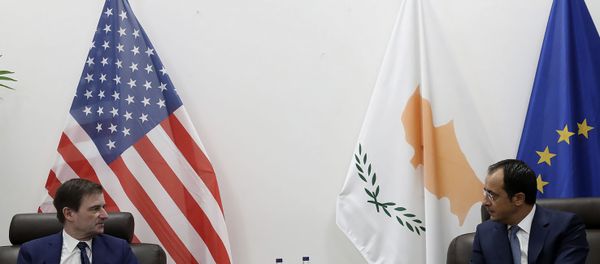 Cyprus' foreign minister Nikos Christodoulides, right, talks with Under Secretary of the United States of America, for Political Affairs, David Hale during their meeting at Larnaca international airport, Cyprus, Sunday, Aug. 16, 2020. Hale's brief stop in Cyprus comes amid heightened tensions over Turkey's hydrocarbons search in waters Greece and Cyprus claim as their own. - Sputnik International