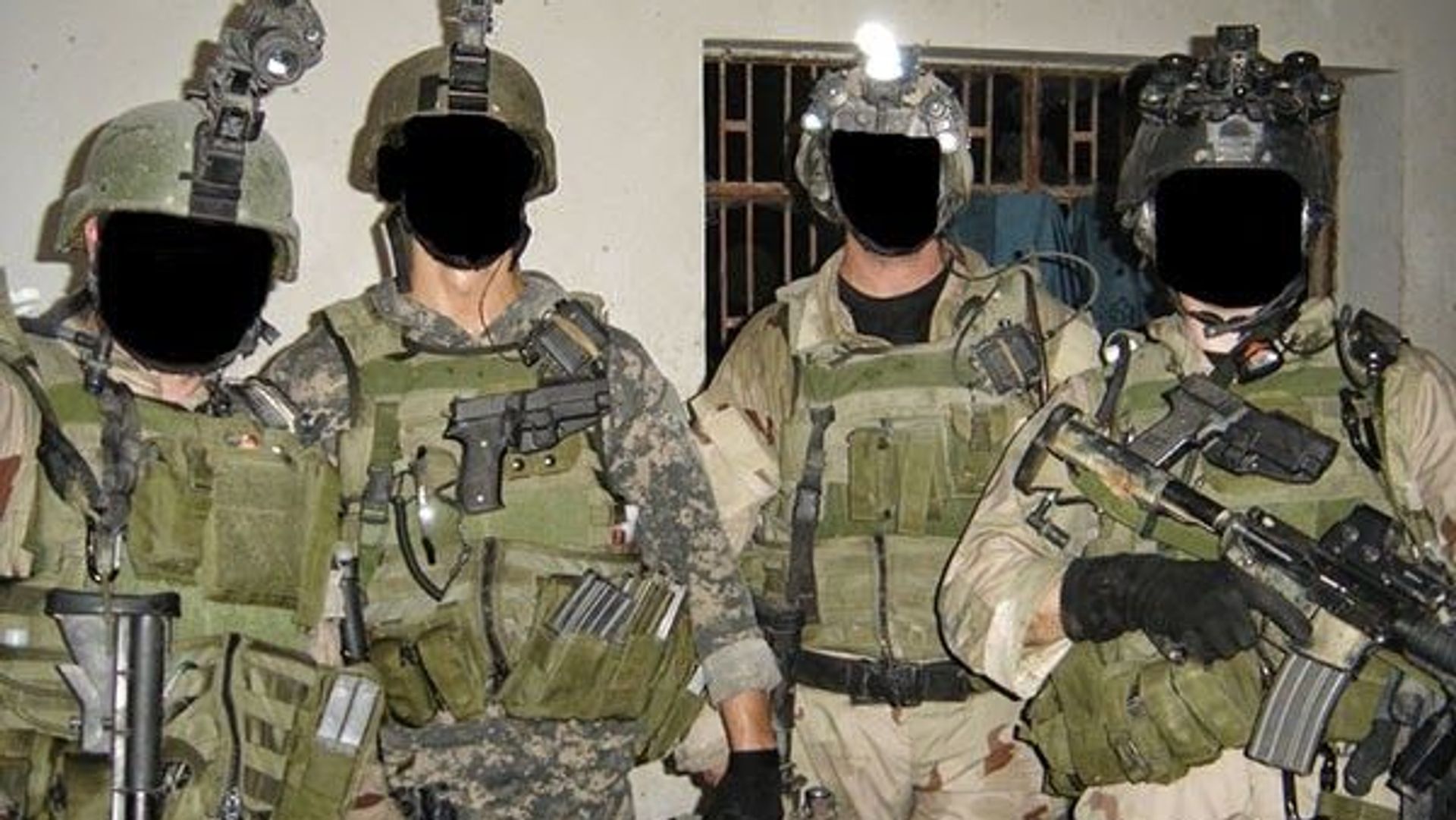 Four mercenaries belonging to Keenie Meenie Services with faces blacked out Four mercenaries belonging to Keenie Meenie Services with faces blacked out - Sputnik International, 1920, 01.09.2023