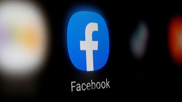 A Facebook logo is displayed on a smartphone in this illustration taken January 6, 2020 - Sputnik International
