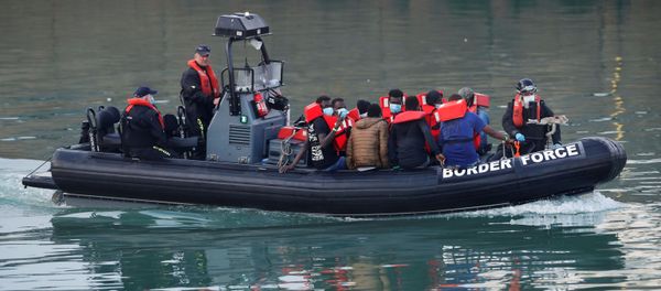 Migrants are brought to Dover harbour by Border Force, in Dover, Britain August 12, 2020 - Sputnik International