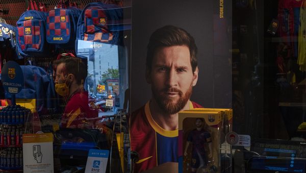 A poster with the face of Barcelona soccer player Lionel Messi is displayed at a F.C. Barcelona store in Barcelona, Spain on Tuesday, Sept. 1, 2020 - Sputnik International