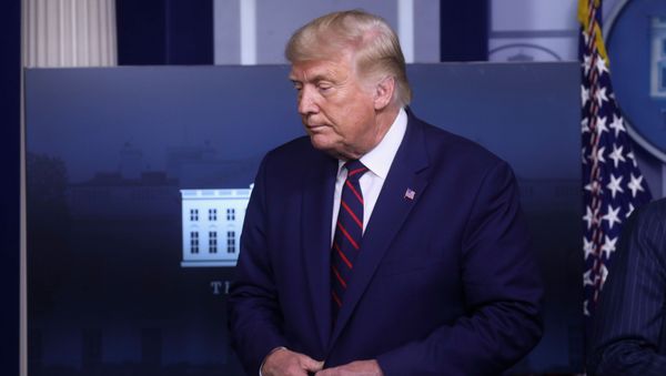 US President Donald Trump steps away from the podium for White House economic adviser Larry Kudlow to speak during a news conference at the White House in Washington, U.S., September 4, 2020. - Sputnik International