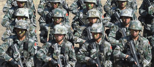 People's Liberation Army (PLA) of China soldiers line up after participating in an anti-terror drill during the Sixth India-China Joint Training exercise Hand in Hand 2016 at HQ 330 Infantry Brigade, in Aundh in Pune district, some 145km southeast of Mumbai, on November 25, 2016. People's Liberation Army (PLA) of China soldiers line up after participating in an anti-terror drill during the Sixth India-China Joint Training exercise Hand in Hand 2016 at HQ 330 Infantry Brigade, in Aundh in Pune district, some 145km southeast of Mumbai, on November 25, 2016. - Sputnik International