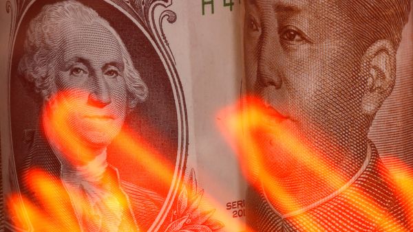 Chinese Yuan and U.S. dollar banknotes are seen behind illuminated stock graph in this illustration taken February 10, 2020.  - Sputnik International