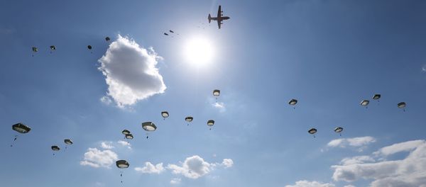 US Army paratroopers jump with parachutes from a Hercules C-130 military transport plane during Noble Partner 2020 multinational exercise, which involves servicemen from Georgia, the United States, the United Kingdom, Poland and France, at Vaziani military base outside Tbilisi, Georgia September 1, 2020. US Army paratroopers jump with parachutes from a Hercules C-130 military transport plane during Noble Partner 2020 multinational exercise, which involves servicemen from Georgia, the United States, the United Kingdom, Poland and France, at Vaziani military base outside Tbilisi, Georgia September 1, 2020. - Sputnik International