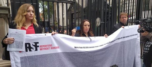 Rebecca Vincent and Stella Moris at Number 10 Downing Street holding up banner with signatures to petition on Julian Assange 7 Sept 2020 Rebecca Vincent and Stella Moris at Number 10 Downing Street holding up banner with signatures to petition on Julian Assange 7 Sept 2020 - Sputnik International