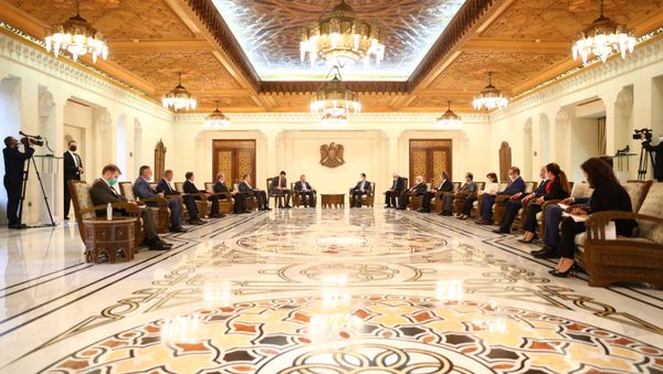 Russian Deputy Prime Minister Yuri Borisov, Foreign Minister Sergei Lavrov, Syrian President Bashar al-Assad and other officials attend a meeting in Damascus, Syria September 7, 2020 Russian Deputy Prime Minister Yuri Borisov, Foreign Minister Sergei Lavrov, Syrian President Bashar al-Assad and other officials attend a meeting in Damascus, Syria September 7, 2020 - Sputnik International