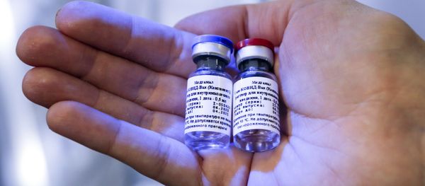 In this handout photo taken on Thursday, 6 August 2020, and provided by the Russian Direct Investment Fund, a new vaccine is on display at the Nikolai Gamaleya National Center of Epidemiology and Microbiology in Moscow, Russia In this handout photo taken on Thursday, 6 August 2020, and provided by the Russian Direct Investment Fund, a new vaccine is on display at the Nikolai Gamaleya National Center of Epidemiology and Microbiology in Moscow, Russia - Sputnik International