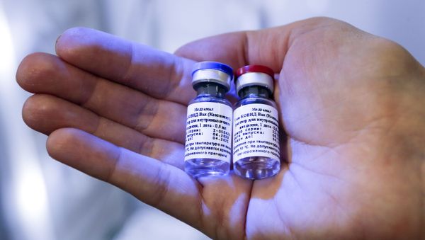 In this handout photo taken on Thursday, Aug. 6, 2020, and provided by Russian Direct Investment Fund, a new vaccine is on display at the Nikolai Gamaleya National Center of Epidemiology and Microbiology in Moscow, Russia In this handout photo taken on Thursday, Aug. 6, 2020, and provided by Russian Direct Investment Fund, a new vaccine is on display at the Nikolai Gamaleya National Center of Epidemiology and Microbiology in Moscow, Russia - Sputnik International