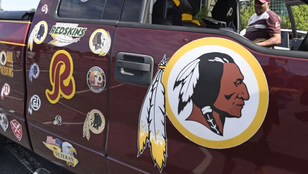 Rodney Johnson of Chesapeake, Va., stands with his truck outside FedEx Field in Landover, Md., Monday, July 13, 2020 - Sputnik International